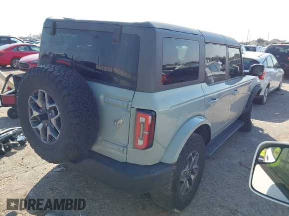 2023 Ford Bronco z VIN 1FMDE5BH5PLB37801, wystawiony jako IAAI lot #41691282 z przebiegiem 21 129 mil mil oraz . Historia ofert i sprzedaży dostępna na DreamBid. Obrazek 4.