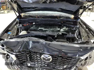 2025 Mazda CX-90 Select z VIN JM3KKAHD1S1201605, wystawiony jako Copart lot #58155135 z przebiegiem Nie podano mil oraz Szkody całkowita. Historia ofert i sprzedaży dostępna na DreamBid. Obrazek 12.