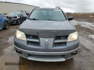 2005 Mitsubishi Outlander z VIN JA4LZ41F75U601526, wystawiony jako Copart lot #50974665 z przebiegiem 265 611 mil mil oraz Szkoda całkowita • Salvage title. Historia ofert i sprzedaży dostępna na DreamBid. Obrazek 5.
