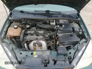 2000 Ford Focus SE z VIN 1FAFP3438YW379761, wystawiony jako Copart lot #58156125 z przebiegiem 103 816 mil mil oraz Szkoda całkowita • Salvage title. Historia ofert i sprzedaży dostępna na DreamBid. Obrazek 11.