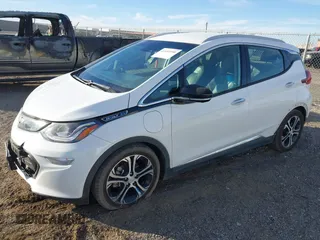 2018 Chevrolet Bolt EV Premier with VIN 1G1FX6S08J4139950, listed as a IAAI auction lot 41151990 with 137,041 mi miles. Bid and sale history available at carsss.com. Image 2.
