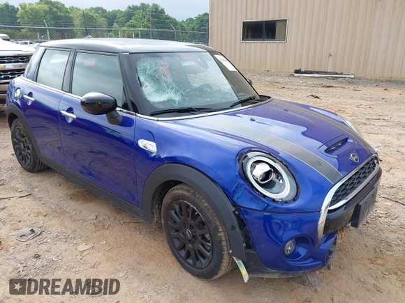 2021 MINI Hardtop 4 Door Cooper S with VIN WMWXU9C00M2N60370, listed as a IAAI auction lot 42426257 with 11,288 mi miles and . Bid and sale history available at DreamBid. Image 1.