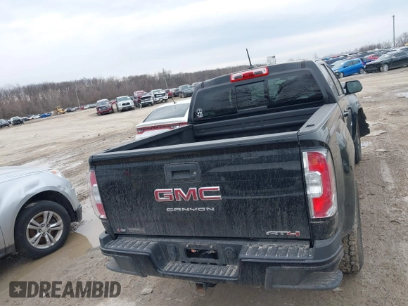 2021 GMC Canyon 4WD AT4 w/Leather with VIN 1GTG6FEN4M1103068, listed as a IAAI auction lot 41673275 with 62,254 mi miles. Bid and sale history available at carsss.com. Image 16.