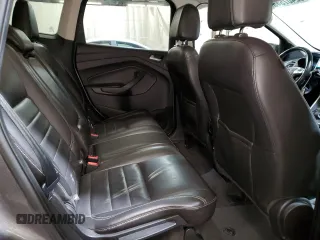 2013 Ford Escape SEL with VIN 1FMCU9HX5DUB97779, listed as a Copart auction lot 52407545 with 145,302 mi miles and Salvage Title. Bid and sale history available at carsss.com. Image 12.