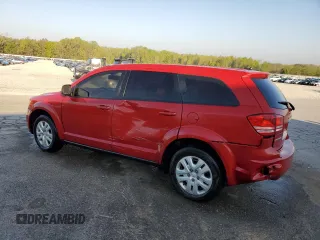 2015 Dodge Journey American Value with VIN 3C4PDCABXFT720583, listed as a Copart auction lot 52882515 with 173,575 mi miles and Salvage Title. Bid and sale history available at DreamBid. Image 2.