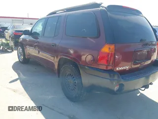 2003 GMC Envoy SLE with VIN 1GKES16S036238094, listed as a IAAI auction lot 41660209 with Not Provided miles and . Bid and sale history available at DreamBid. Image 3.