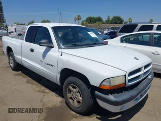 2001 Dodge Dakota z VIN 1B7GL22X91S188051, wystawiony jako IAAI lot #40048902 z przebiegiem 304 305 mil mil oraz . Historia ofert i sprzedaży dostępna na DreamBid. Obrazek 1.