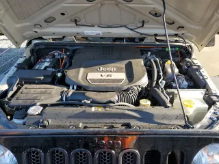 2018 Jeep Wrangler JK Unlimited Sport S with VIN 1C4BJWDG8JL879277, listed as a Copart auction lot 75980814 with 71,810 mi miles and Salvage Title. Bid and sale history available at carsss.com. Image 12.