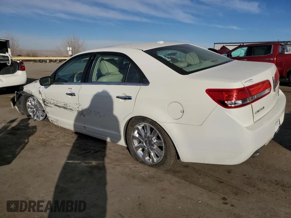 2012 Lincoln MKZ with VIN 3LNHL2JC0CR810906, listed as a Copart auction lot 84970434 with 98,277 mi miles and Salvage Title. Bid and sale history available at DreamBid. Image 2.