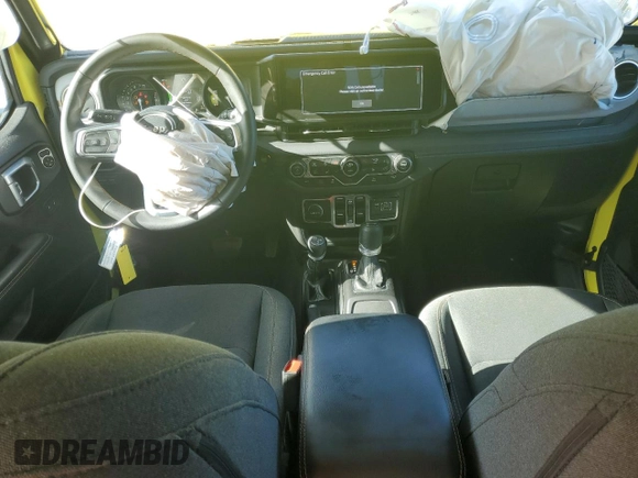 2024 Jeep Wrangler Sahara with VIN 1C4RJXP6XRW238620, listed as a Copart auction lot 63217765 with 29,304 mi miles and Clean title. Bid and sale history available at DreamBid. Image 8.