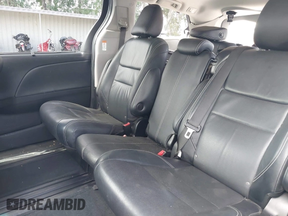 2015 Toyota Sienna SE with VIN 5TDXK3DCXFS680767, listed as a IAAI auction lot 42237107 with 105,912 mi miles and . Bid and sale history available at DreamBid. Image 8.