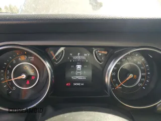 2023 Jeep Wrangler Sport with VIN 1C4HJXAG3PW618988, listed as a Copart auction lot 71615934 with 34,342 mi miles and Salvage title. Bid and sale history available at DreamBid. Image 9.