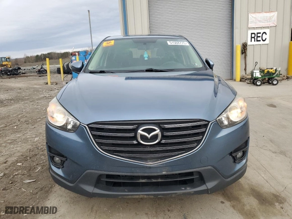 2016 Mazda CX-5 Touring with VIN JM3KE4CY9G0608152, listed as a Copart auction lot 51568775 with 142,676 mi miles and Salvage Title. Bid and sale history available at carsss.com. Image 5.