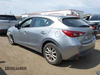 2014 Mazda 3 i Touring with VIN JM1BM1L70E1185972, listed as a IAAI auction lot 42005779 with 90,175 mi miles and . Bid and sale history available at DreamBid. Image 3.