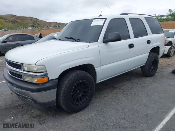 2005 Chevrolet Tahoe LS with VIN 1GNEC13V85J243672, listed as a IAAI auction lot 41801268 with 202,624 mi miles. Bid and sale history available at carsss.com. Image 2.