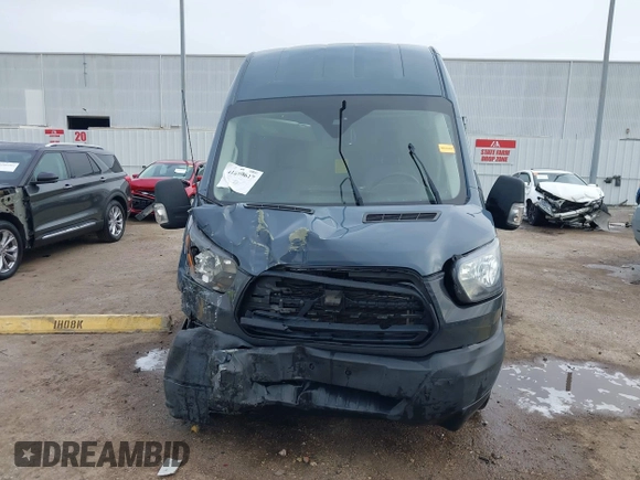 2019 Ford Transit with VIN 1FTYR3XMXKKB90237, listed as a IAAI auction lot 41859617 with 86,081 mi miles and . Bid and sale history available at DreamBid. Image 12.