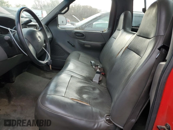 2001 Ford F-150 XL z VIN 3FTZF17291MA72686, wystawiony jako Copart lot #83103904 z przebiegiem 126 018 mil mil oraz Szkoda całkowita • Salvage title. Historia ofert i sprzedaży dostępna na DreamBid. Obrazek 7.