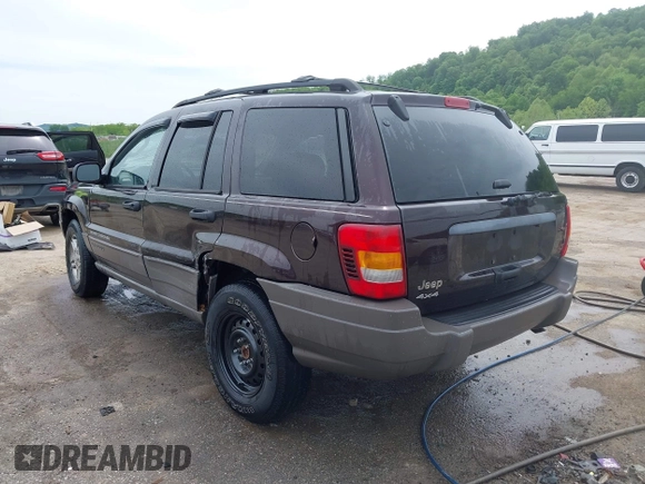 2004 Jeep Grand Cherokee Laredo z VIN 1J4GW48S94C209326, wystawiony jako IAAI lot #42309565 z przebiegiem 159 429 mil mil oraz . Historia ofert i sprzedaży dostępna na DreamBid. Obrazek 3.