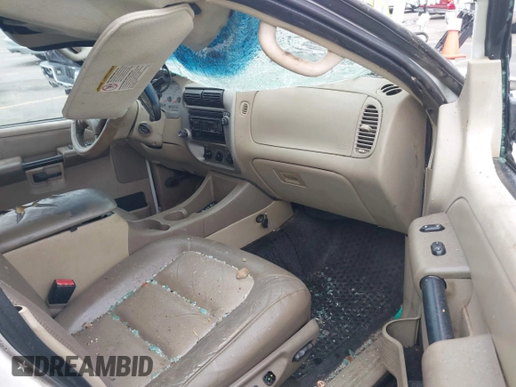 2004 Ford Explorer Sport Trac XLS z VIN 1FMZU67K64UB35063, wystawiony jako IAAI lot #42092229 z przebiegiem 344 554 mil mil oraz . Historia ofert i sprzedaży dostępna na DreamBid. Obrazek 5.