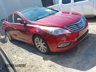 2014 Hyundai Azera Limited z VIN KMHFH4JG1EA372224, wystawiony jako IAAI lot #42197395 z przebiegiem 215 954 mil mil oraz . Historia ofert i sprzedaży dostępna na DreamBid. Obrazek 1.