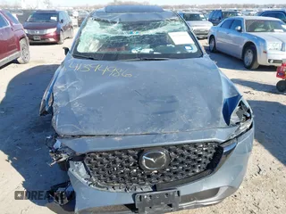 2022 Mazda CX-5 2.5 S Preferred Package with VIN JM3KFBCM7N1529973, listed as a IAAI auction lot 41394986 with 1 mi miles. Bid and sale history available at carsss.com. Image 6.