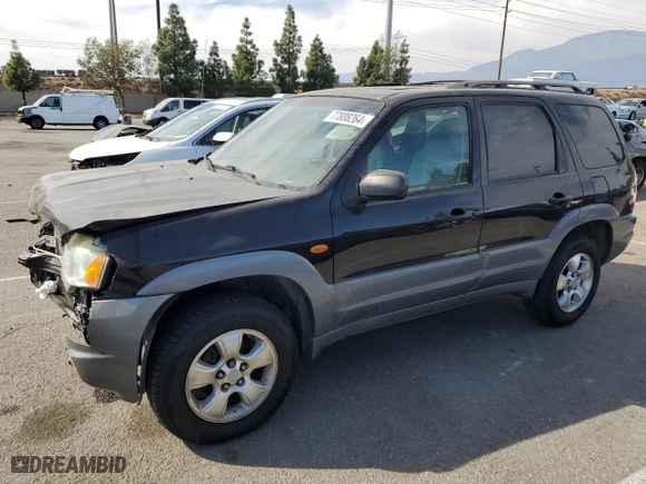2001 Mazda Tribute LX with VIN 4F2YU09151KM38909, listed as a Copart auction lot 77808264 with 136,005 mi miles and Salvage Title. Bid and sale history available at carsss.com. Image 1.