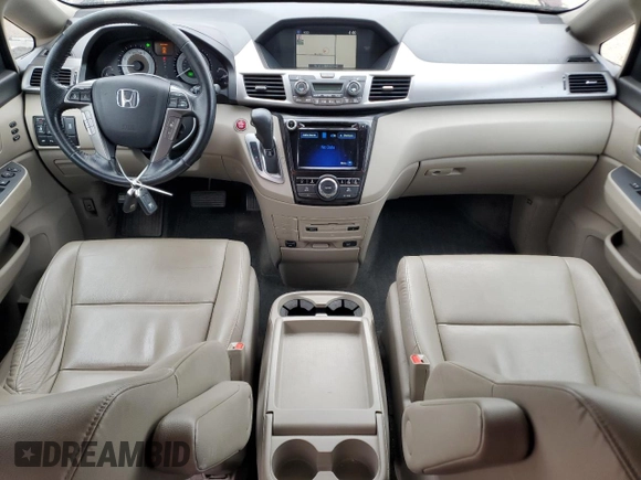 2016 Honda Odyssey Touring Elite with VIN 5FNRL5H9XGB109463, listed as a Copart auction lot 57483225 with 182,450 mi miles and Salvage title. Bid and sale history available at DreamBid. Image 8.