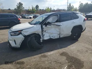 2021 Toyota RAV4 Hybrid XSE with VIN 2T3E6RFV1MW028094, listed as a Copart auction lot 52596615 with 68,497 mi miles and Salvage title. Bid and sale history available at DreamBid. Image 1.