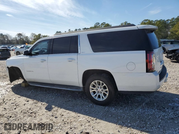 2015 GMC Yukon XL SLT with VIN 1GKS1HKC5FR255473, listed as a Copart auction lot 88680595 with 198,265 mi miles and Salvage Title. Bid and sale history available at carsss.com. Image 2.