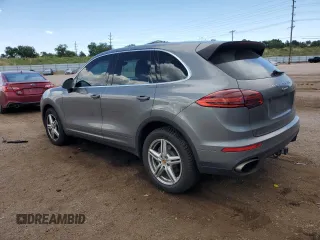 2016 Porsche Cayenne z VIN WP1AA2A21GKA10062, wystawiony jako Copart lot #64639685 z przebiegiem 52 962 mil mil oraz Szkoda całkowita • Salvage title. Historia ofert i sprzedaży dostępna na DreamBid. Obrazek 2.