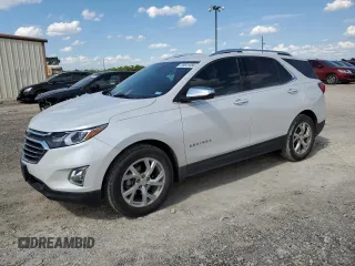 2020 Chevrolet Equinox Premier z VIN 3GNAXNEV5LS705107, wystawiony jako Copart lot #58541684 z przebiegiem 55 566 mil mil oraz Czysty tytuł • Clean title. Historia ofert i sprzedaży dostępna na DreamBid. Obrazek 1.