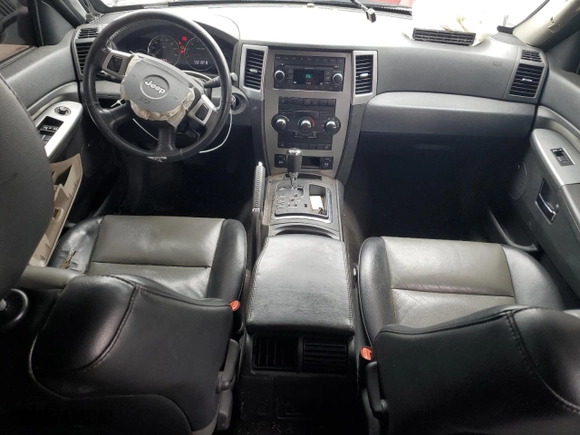 2009 Jeep Grand Cherokee Laredo with VIN 1J8GR48K89C522896, listed as a Copart auction lot 51656265 with 211,359 mi miles and Salvage Title. Bid and sale history available at carsss.com. Image 8.