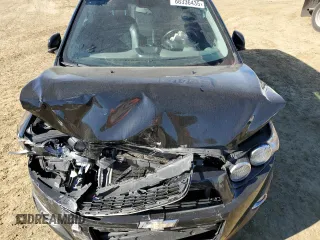 2012 Chevrolet Sonic LTZ z VIN 1G1JE6SH5C4195594, wystawiony jako Copart lot #88336435 z przebiegiem 105 112 mil mil oraz Szkoda całkowita • Salvage title. Historia ofert i sprzedaży dostępna na DreamBid. Obrazek 13.
