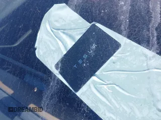 2023 Tesla Model 3 z VIN 5YJ3E1EA0PF577869, wystawiony jako IAAI lot #41468956 z przebiegiem 38 760 mil mil oraz . Historia ofert i sprzedaży dostępna na DreamBid. Obrazek 11.