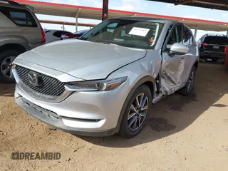 2017 Mazda CX-5 Grand Touring with VIN JM3KFADL3H0121772, listed as a IAAI auction lot 41935183 with 48,869 mi miles and . Bid and sale history available at carsss.com. Image 17.