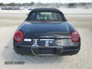 2002 Ford Thunderbird Hardtop Premium with VIN 1FAHP60A12Y120989, listed as a Copart auction lot 77573084 with Not Provided miles and Salvage Title. Bid and sale history available at DreamBid. Image 6.