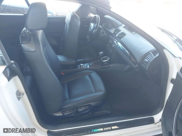 2013 BMW 1 Series 128i with VIN WBAUN1C55DVR01404, listed as a IAAI auction lot 41682695 with 100,948 mi miles. Bid and sale history available at carsss.com. Image 5.