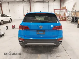 2023 Volkswagen Taos SE z VIN 3VVNX7B24PM301968, wystawiony jako IAAI lot #41155733 z przebiegiem 77 454 mil mil oraz . Historia ofert i sprzedaży dostępna na DreamBid. Obrazek 16.