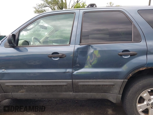 2005 Ford Escape XLT with VIN 1FMYU03165KD74390, listed as a IAAI auction lot 42799963 with 262,762 mi miles and . Bid and sale history available at DreamBid. Image 6.