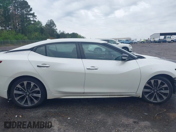 2016 Nissan Maxima SV z VIN 1N4AA6AP2GC401273, wystawiony jako IAAI lot #41898456 z przebiegiem 139 720 mil mil oraz . Historia ofert i sprzedaży dostępna na DreamBid. Obrazek 14.