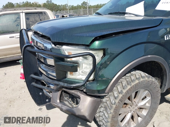 2016 Ford F-150 XLT with VIN 1FTEW1EG1GFC71964, listed as a IAAI auction lot 41851054 with 99,267 mi miles. Bid and sale history available at carsss.com. Image 6.
