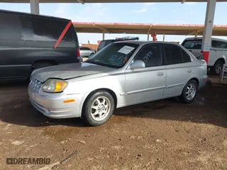 2003 Hyundai Accent GL with VIN KMHCG45C93U476176, listed as a IAAI auction lot 41940608 with 212,264 mi miles. Bid and sale history available at carsss.com. Image 2.