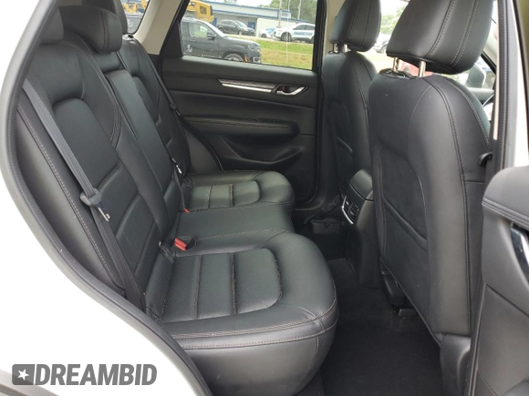 2018 Mazda CX-5 Grand Touring with VIN JM3KFBDM7J0302037, listed as a Copart auction lot 63021845 with Not provided miles and Salvage title. Bid and sale history available at DreamBid. Image 11.
