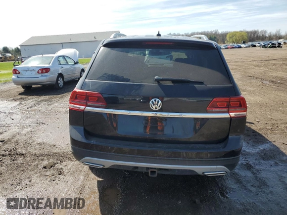 2018 Volkswagen Atlas SE z VIN 1V2LR2CA4JC584601, wystawiony jako Copart lot #52346605 z przebiegiem 71 990 mil mil oraz Szkody całkowita. Historia ofert i sprzedaży dostępna na DreamBid. Obrazek 6.
