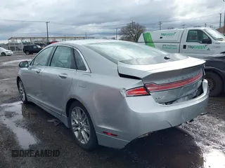 2014 Lincoln MKZ with VIN 3LN6L2G99ER824115, listed as a IAAI auction lot 41946660 with 134,323 mi miles. Bid and sale history available at carsss.com. Image 3.