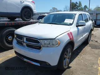 2013 Dodge Durango Crew with VIN 1C4RDHDG8DC698668, listed as a IAAI auction lot 41876841 with 160,012 mi miles and . Bid and sale history available at DreamBid. Image 2.