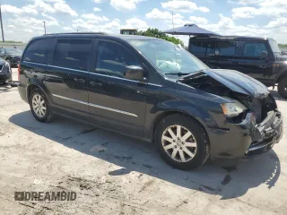2014 Chrysler Town & Country Touring with VIN 2C4RC1BG3ER397456, listed as a Copart auction lot 56717745 with 193,811 mi miles and Clean Title. Bid and sale history available at DreamBid. Image 4.