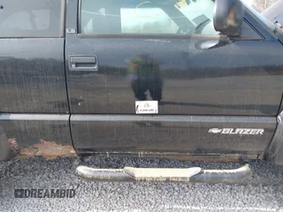 2000 Chevrolet Blazer LS z VIN 1GNCT18W1YK112722, wystawiony jako IAAI lot #41758275 z przebiegiem 157 730 mil mil oraz . Historia ofert i sprzedaży dostępna na DreamBid. Obrazek 6.