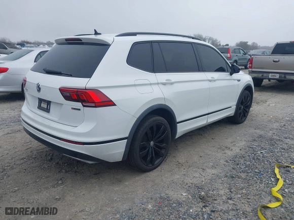 2020 Volkswagen Tiguan SE with VIN 3VV2B7AX1LM151388, listed as a IAAI auction lot 41480146 with 154,567 mi miles. Bid and sale history available at carsss.com. Image 4.