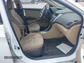 2013 Hyundai Accent GLS with VIN KMHCT4AE3DU325550, listed as a IAAI auction lot 41185651 with 128,791 mi miles and . Bid and sale history available at DreamBid. Image 5.